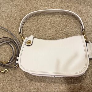 Coach Swinger  Used Good